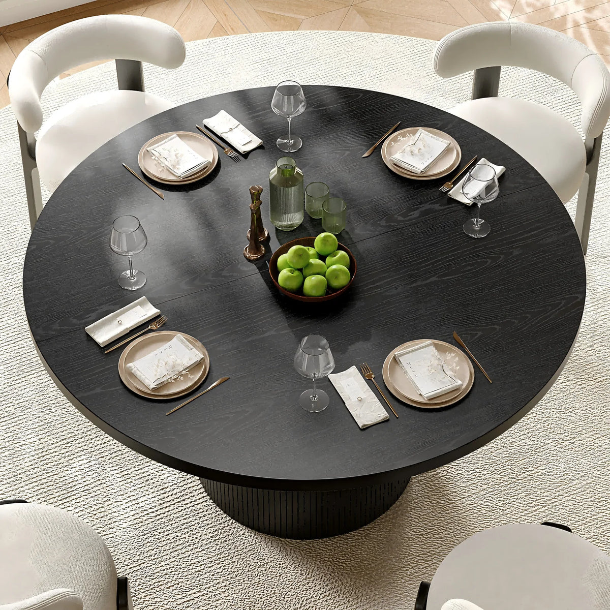 Overhead view of the Duskwhisper black round tabletop with wood-grain pattern, styled with four place settings.
