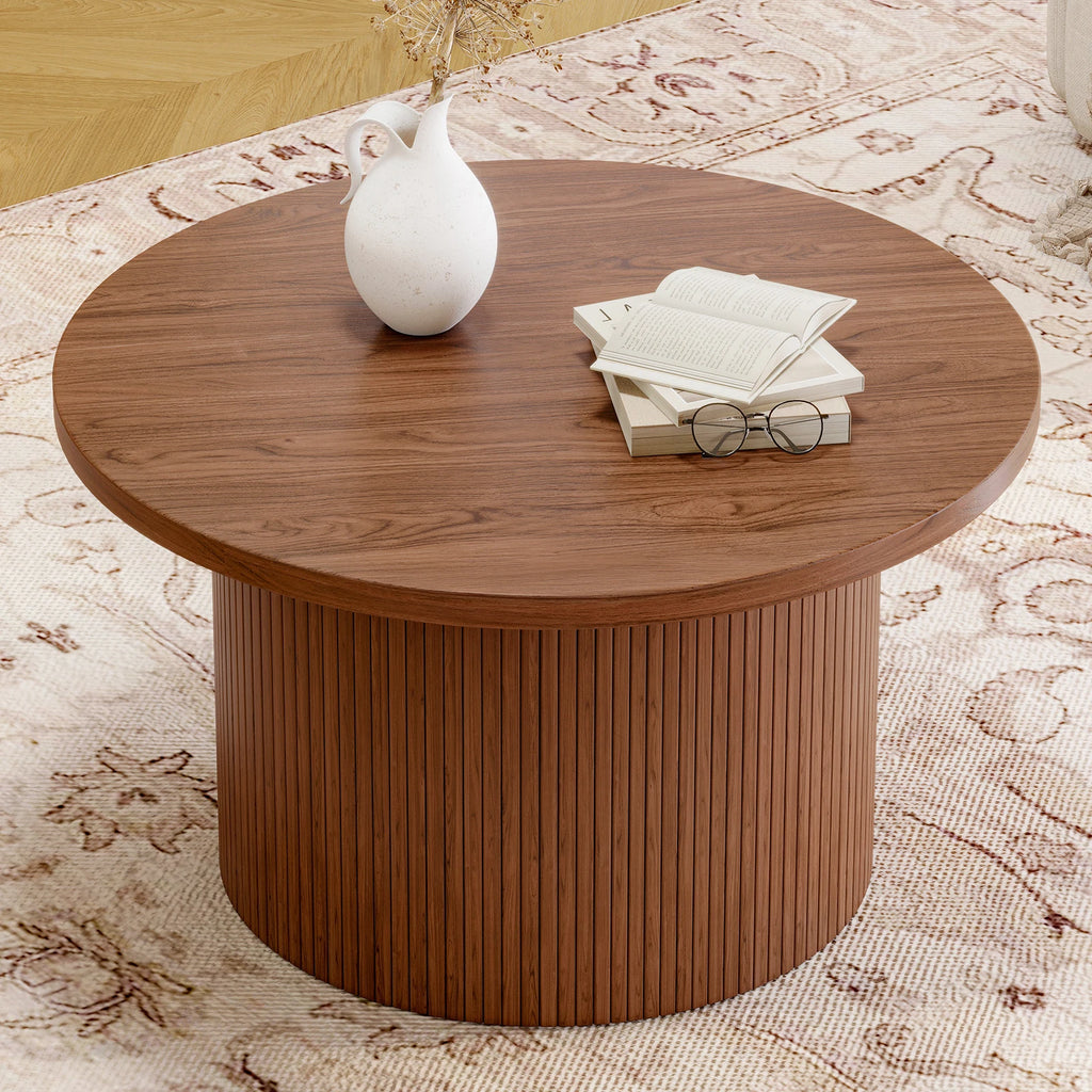 Close view of Daydreamarc's round walnut-look tabletop and fluted base