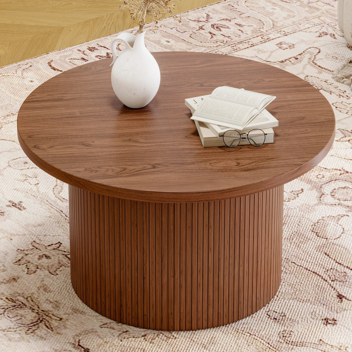 Close view of Daydreamarc's round walnut-look tabletop and fluted base