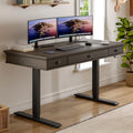 Echobloom walnut-look standing desk with three drawers and black T-shaped legs in a home office