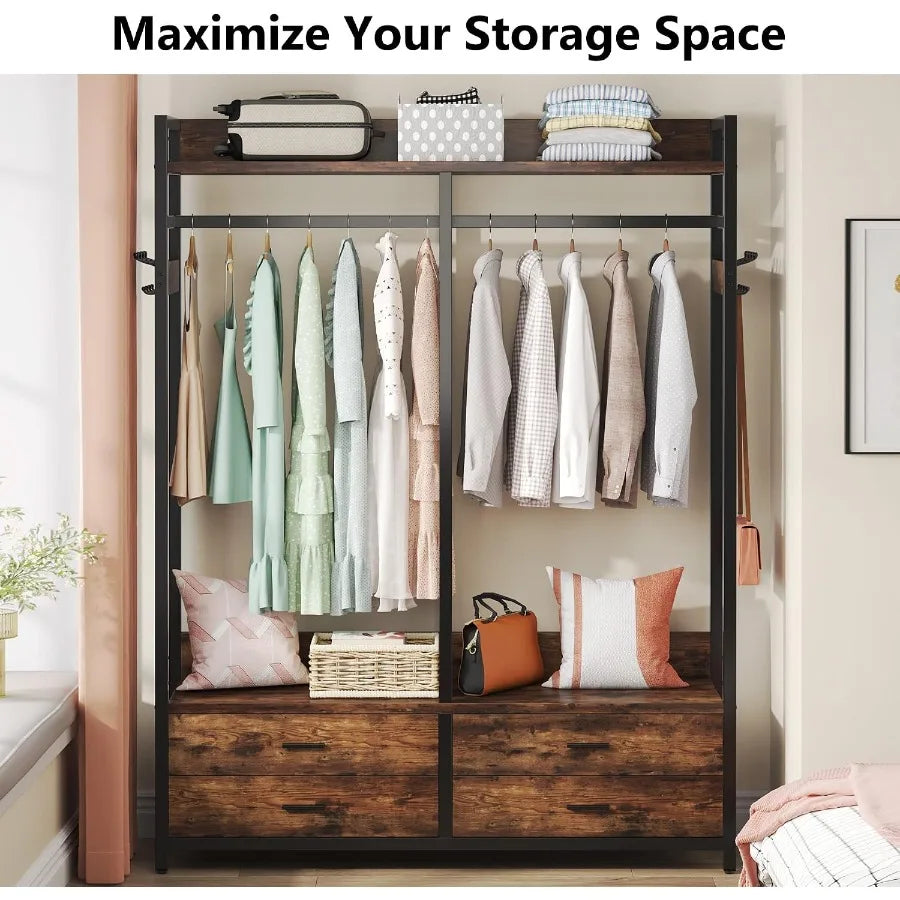 Storage display showing folded linens on the top shelf and clothing hanging above the closet organizer drawers.