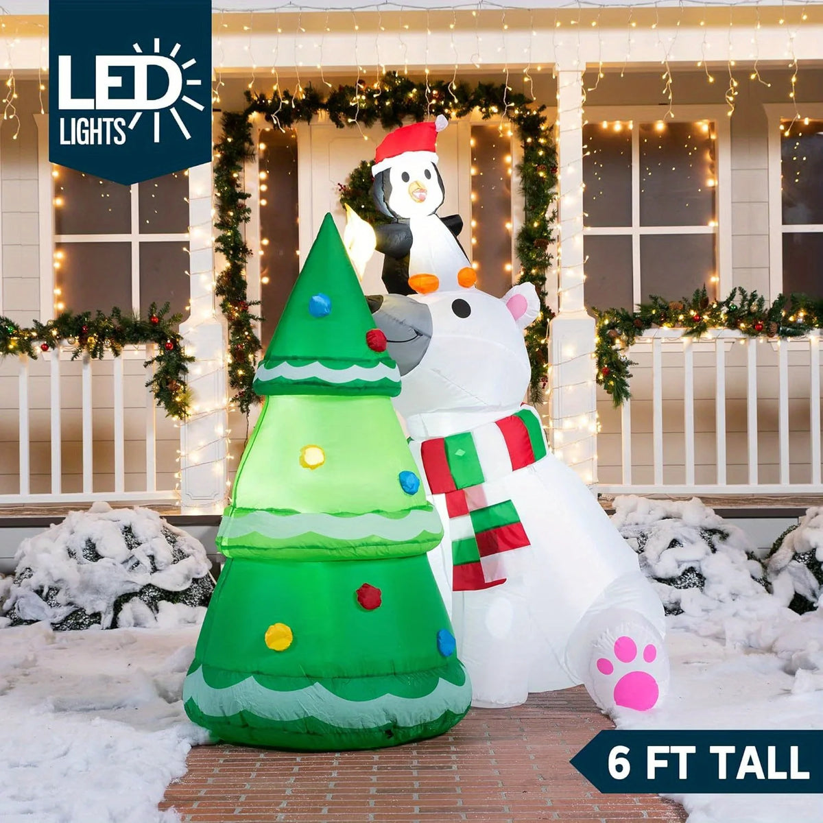 Treestar six-foot-tall Christmas inflatable glowing in a nighttime yard display.