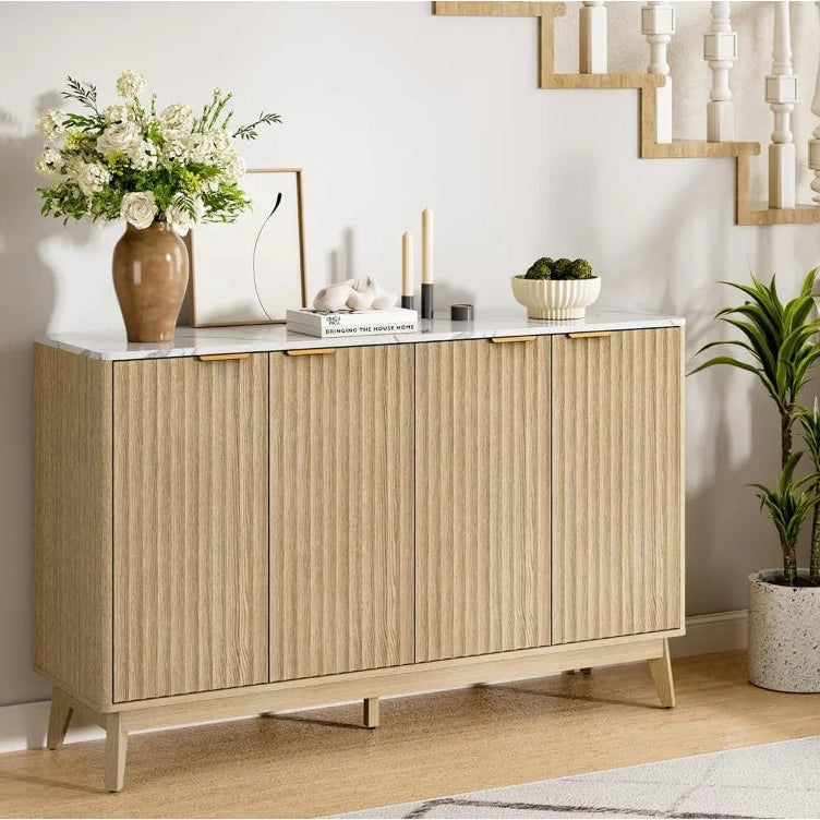 Light wood sideboard with decorative items in a home setting