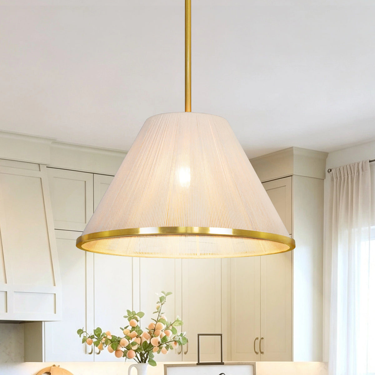 Loomveil pendant with a light woven-thread shade and gold-tone metal details.
