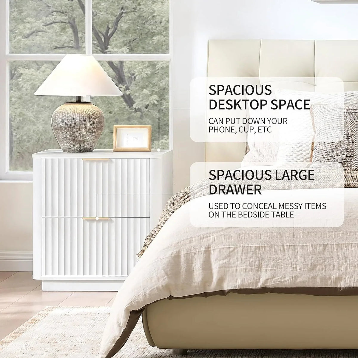 Lucentarc white two-drawer nightstand beside an upholstered bed.