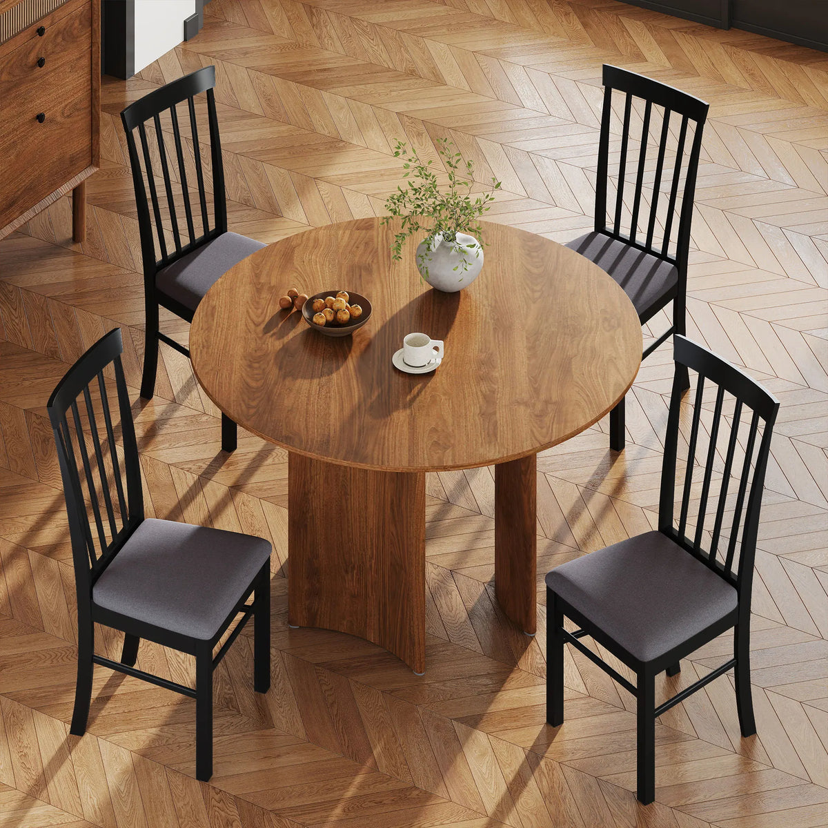 Four Novacrest chairs staged around a round dining table