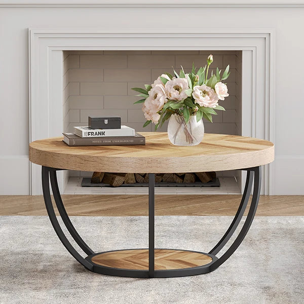 Living room with beige armchairs, a wooden coffee table, and a fireplace.