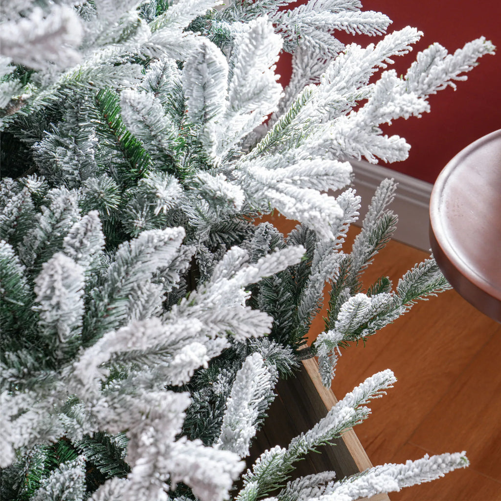 Close-up of Pinehaven green branch tips covered with white flocking