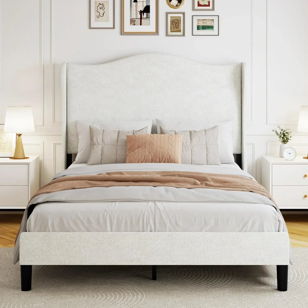 Front view of tall curved beige bouclé headboard and queen platform bed