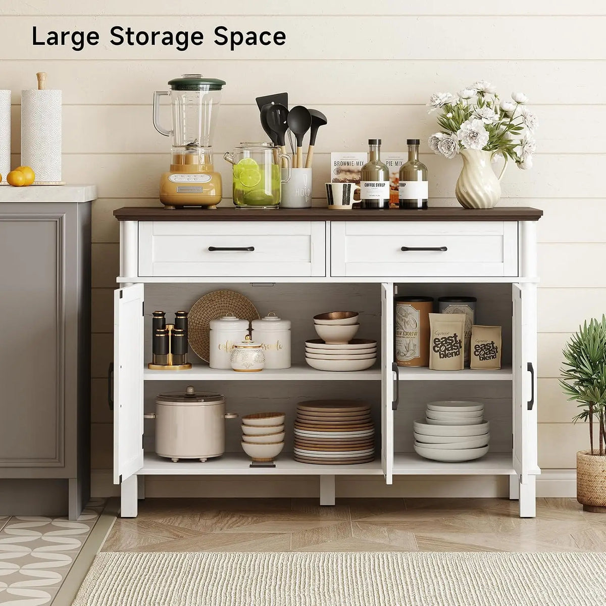 Ivory Reedhalo sideboard with open doors showing dishes and kitchen storage on the shelves