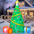 Starwhirl tree with golden garland details and multicolor lighting displayed outdoors after dark.