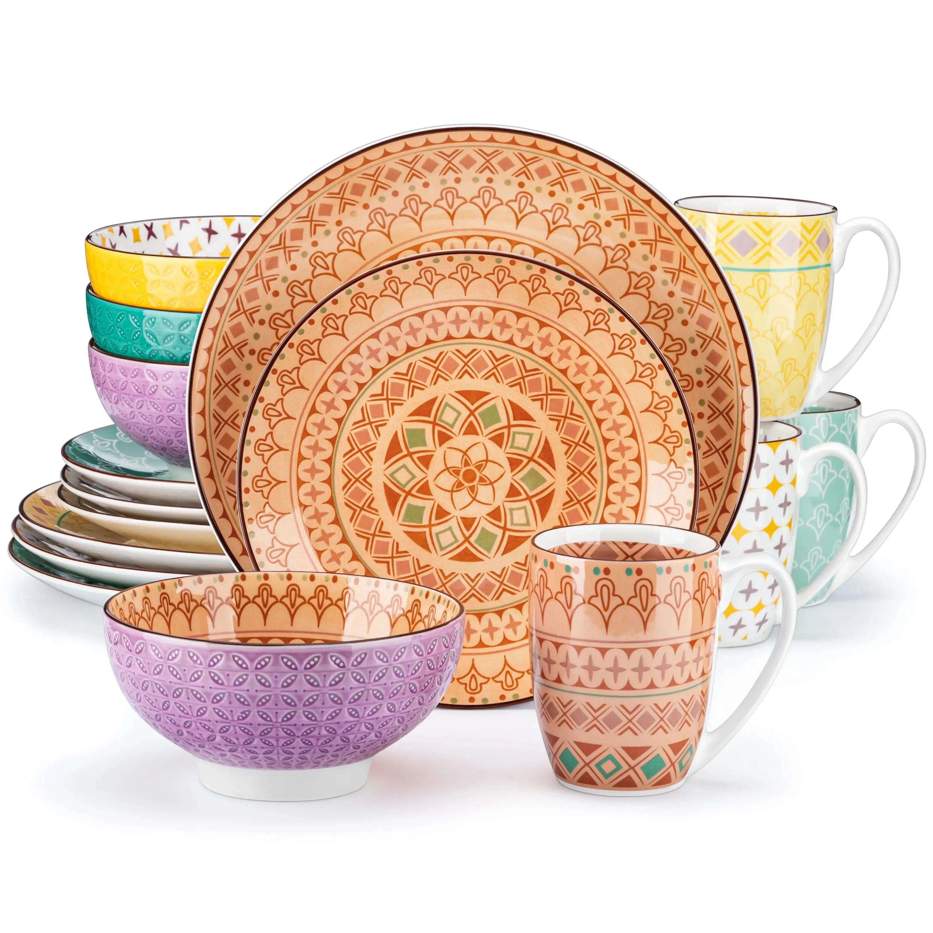 Colorful ceramic dinnerware set with geometric patterns on a white background