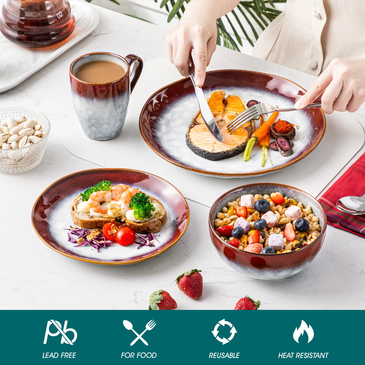 Red and gray plates, bowl and mug in a meal setting above food-use symbols.