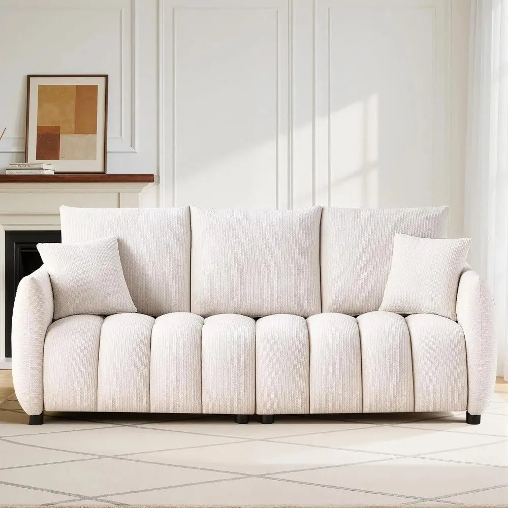 Loftelle Beige sofa with three back cushions, two matching pillows and a channel-detailed seat.