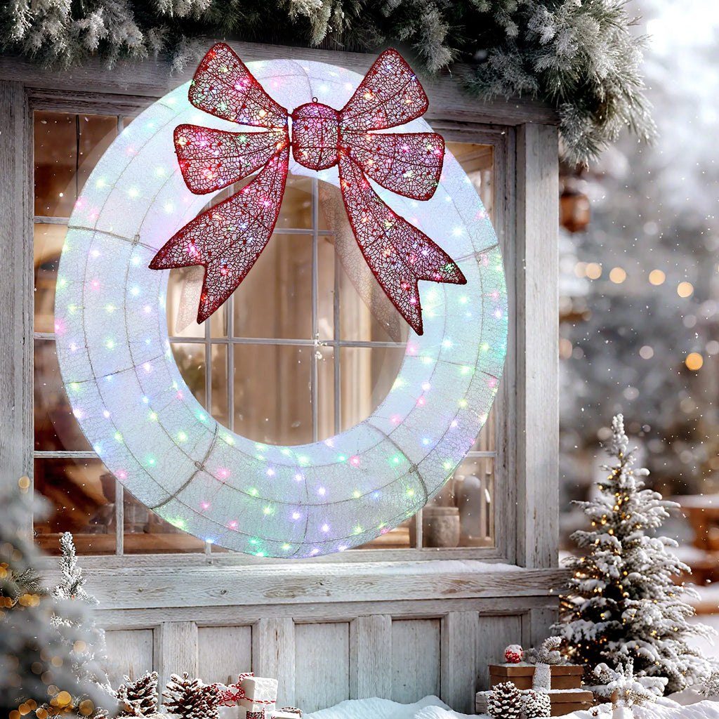 Glowmere Christmas wreath displayed as a large illuminated holiday decoration