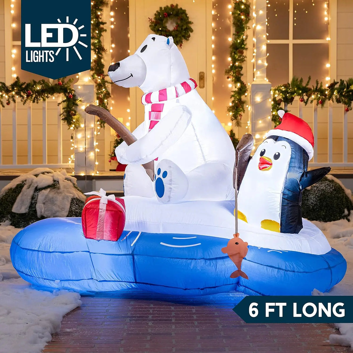 Frostcast fishing-scene inflatable illuminated at night with a six-foot length label.