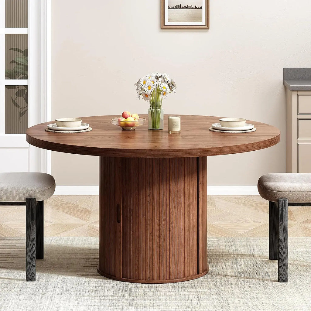 Rhymelark round dining table with the fluted pedestal door closed