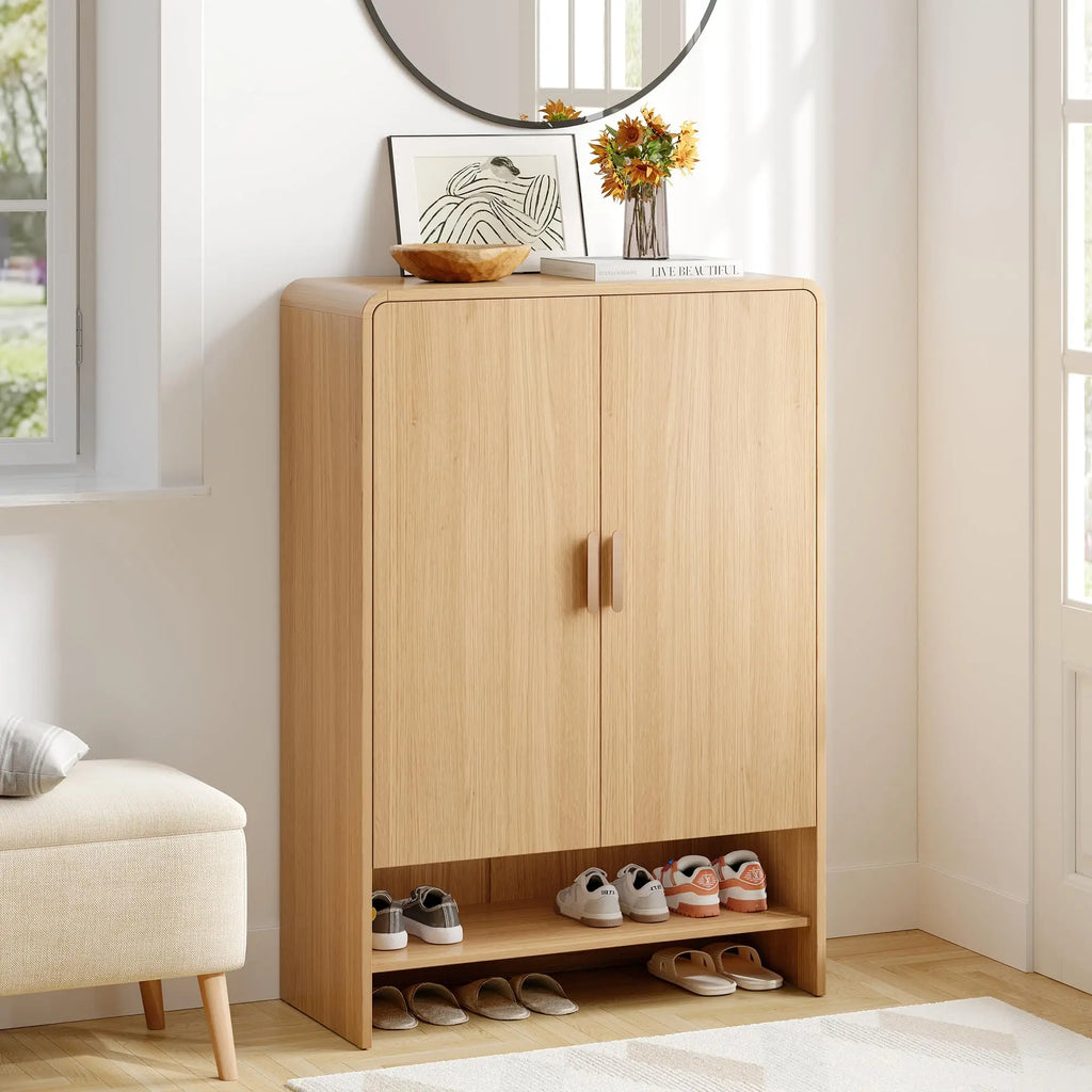 Hushline Oak shoe cabinet with closed double doors and an open lower shelf.