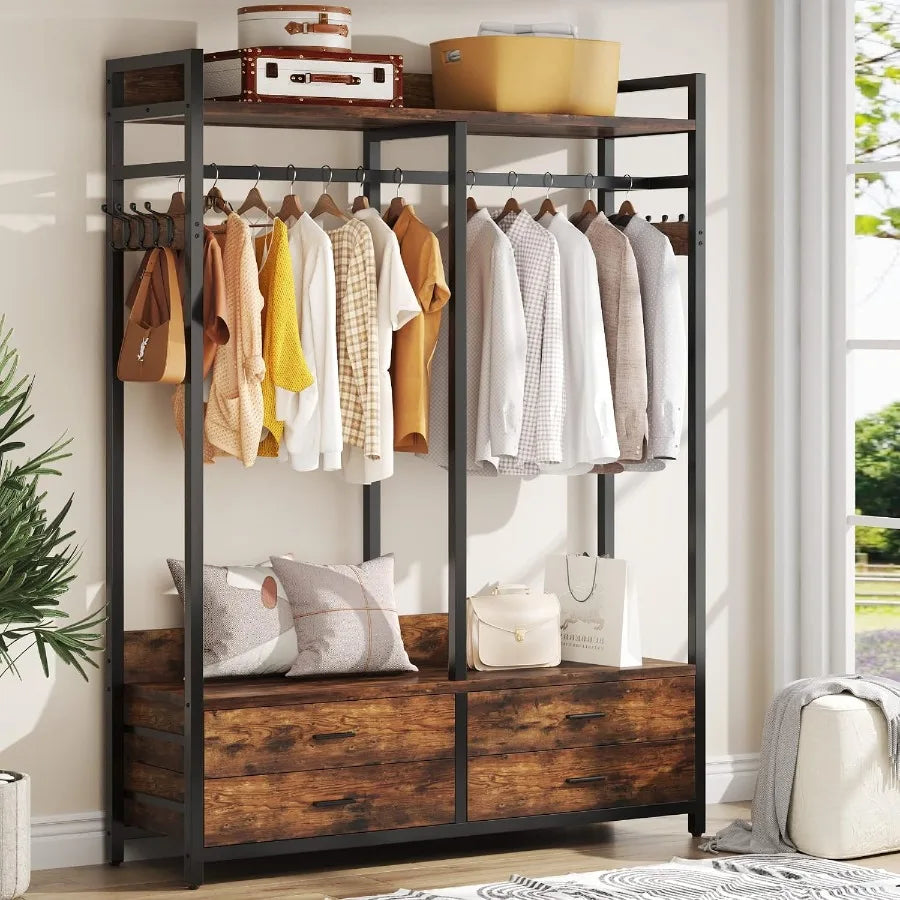 Bedroom display of the open closet organizer with shirts on its rail, bags on its shelf, and drawers closed.