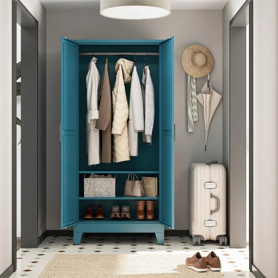Entryway setting showing the blue wardrobe with full-length hanging space and lower storage.