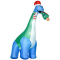 Merrysaurus dinosaur inflatable with Santa hat, striped scarf, and Christmas tree held in its mouth