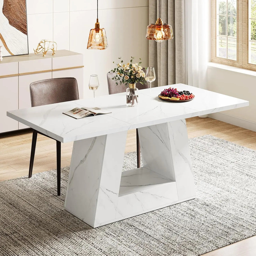 Modern dining table with marble-like finish in a stylish room.