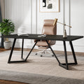 Modern office desk with a chair and decor in a room.
