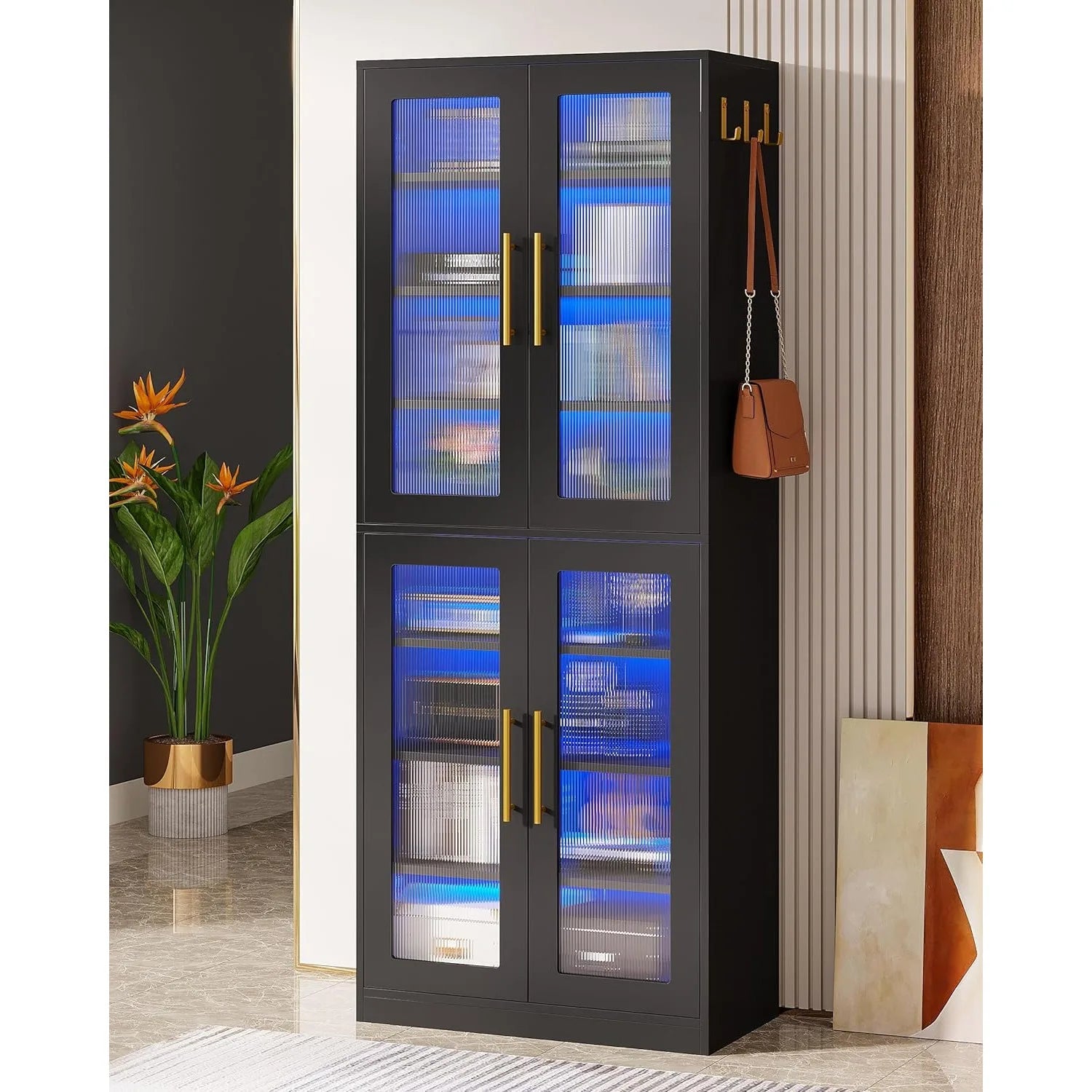 Black tall cabinet with glass doors in a room setting