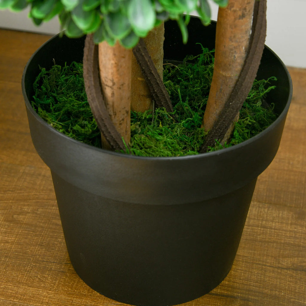 Rhymecharm black nursery pot close-up with faux moss and trunk bases