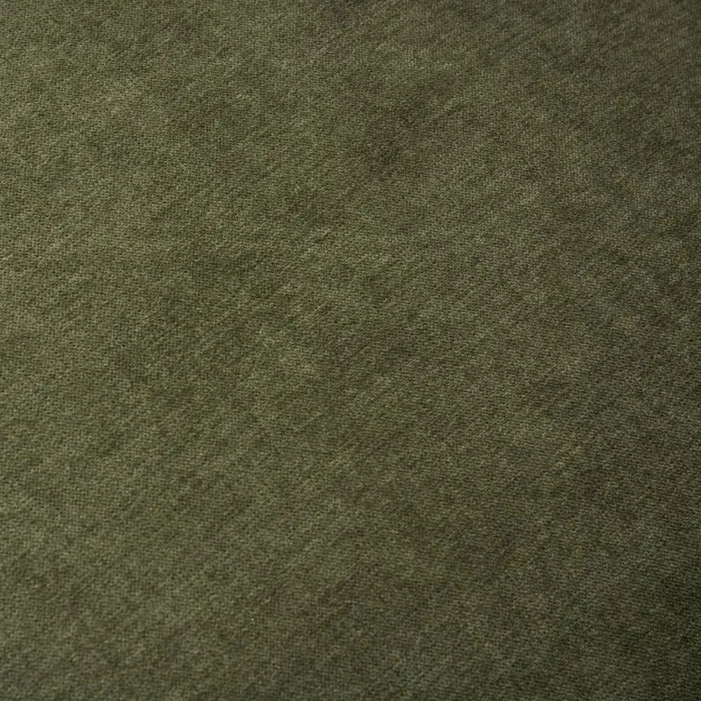 Close-up of textured green fabric upholstery