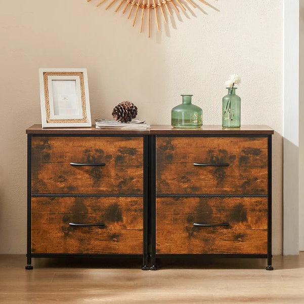 Wooden dresser with decorative items in a room setting