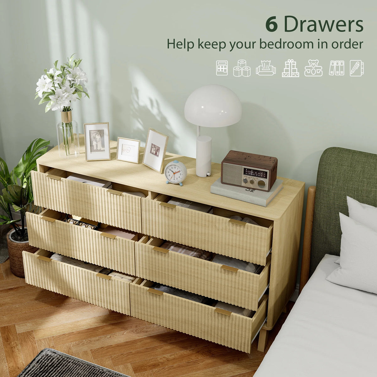 Sunbeamcrest six drawers shown open with clothing stored inside.