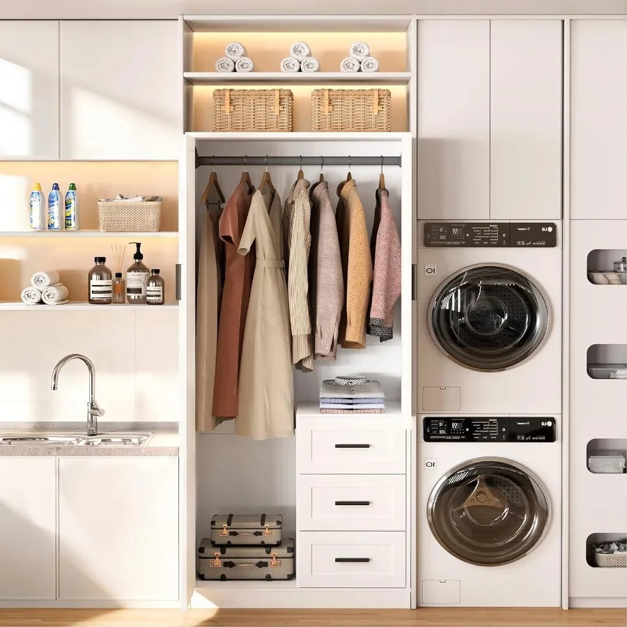 White wardrobe styled in a laundry room beside appliances, with hanging clothes and three drawers visible.
