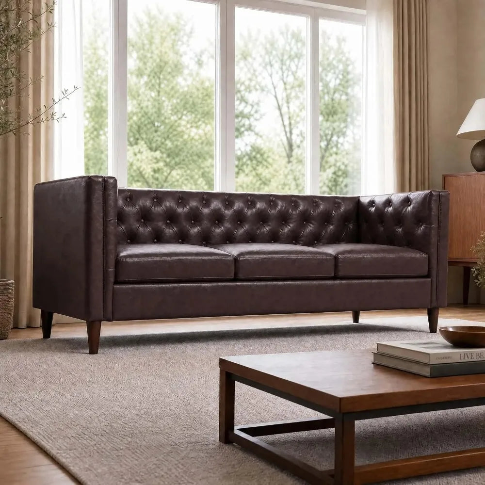 Brown Fennwick sofa with tufted back and matching brown upholstery in window-lit room