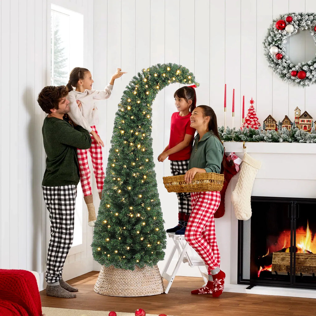 Whimsyglow 6-foot whimsical Christmas tree displayed indoors