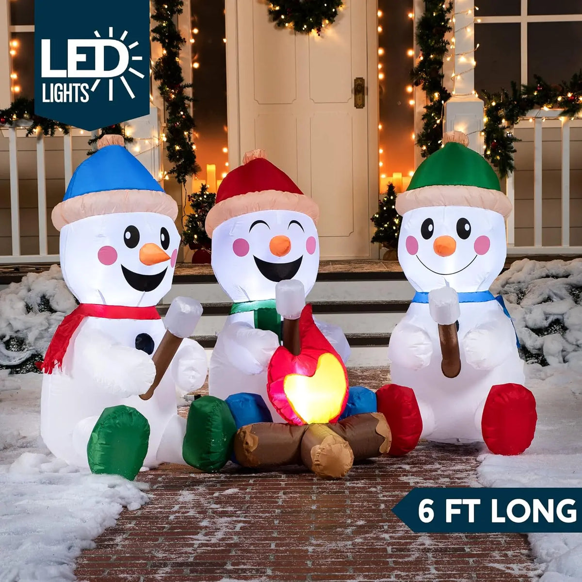 Snowmingle illuminated campfire scene with three snowmen and a six-foot length label.