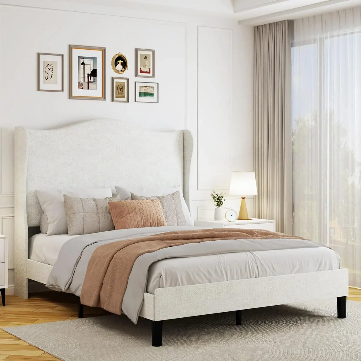Bellorie beige bouclé wingback queen platform bed with bedding in a bright bedroom