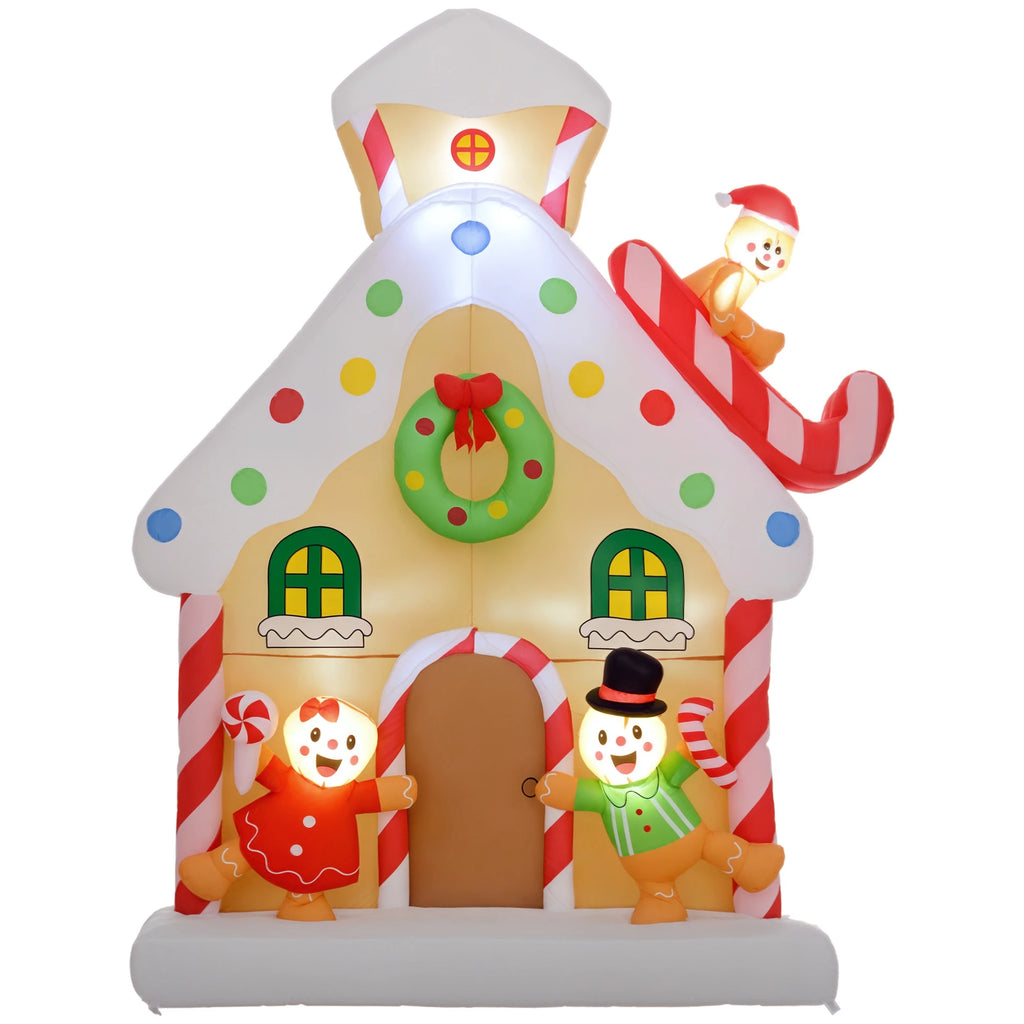 Gingerhaven gingerbread house inflatable with three gingerbread figures and multicolor candy details