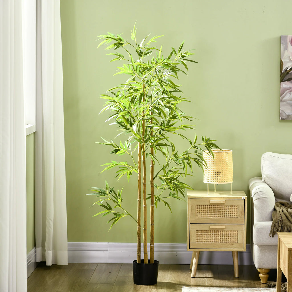 Arusha artificial bamboo tree in a green-walled living room