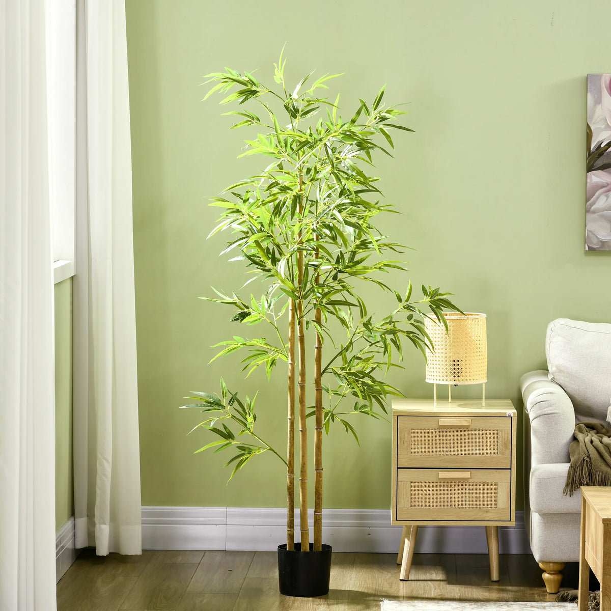 Arusha artificial bamboo tree in a green-walled living room