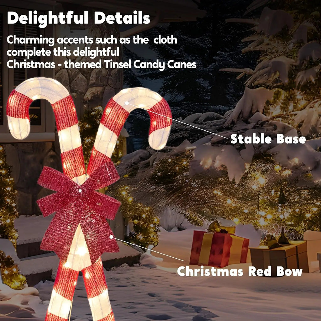 Close-up of Bowglint's illuminated red-and-white candy canes and red bow with detail callouts.