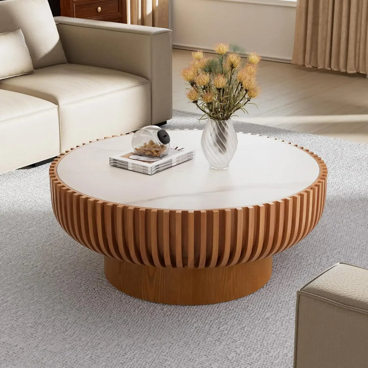 Orelia 31.5-inch round coffee table with a white sintered-stone top and projecting slatted wood-look base