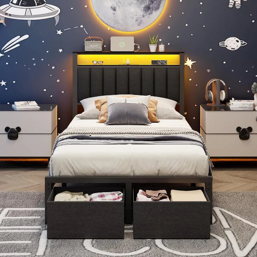 Dark gray bed with warm headboard lighting and two drawers pulled forward