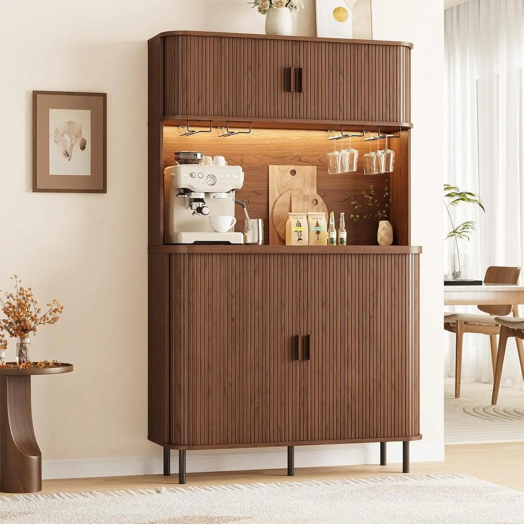 Sablenote brown fluted bar cabinet with closed upper and lower doors and an illuminated counter.