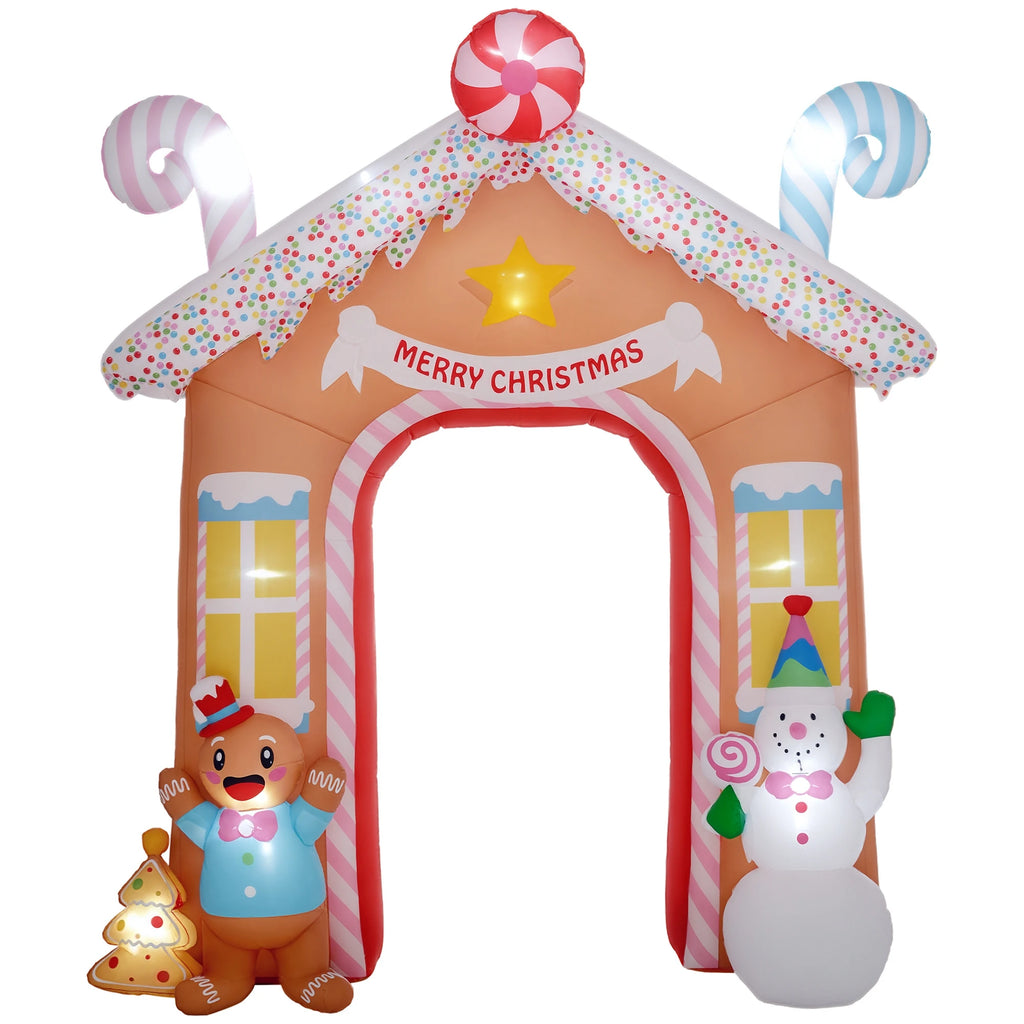 Gingerlane inflatable gingerbread house archway with candy decorations, a gingerbread figure, and a snowman