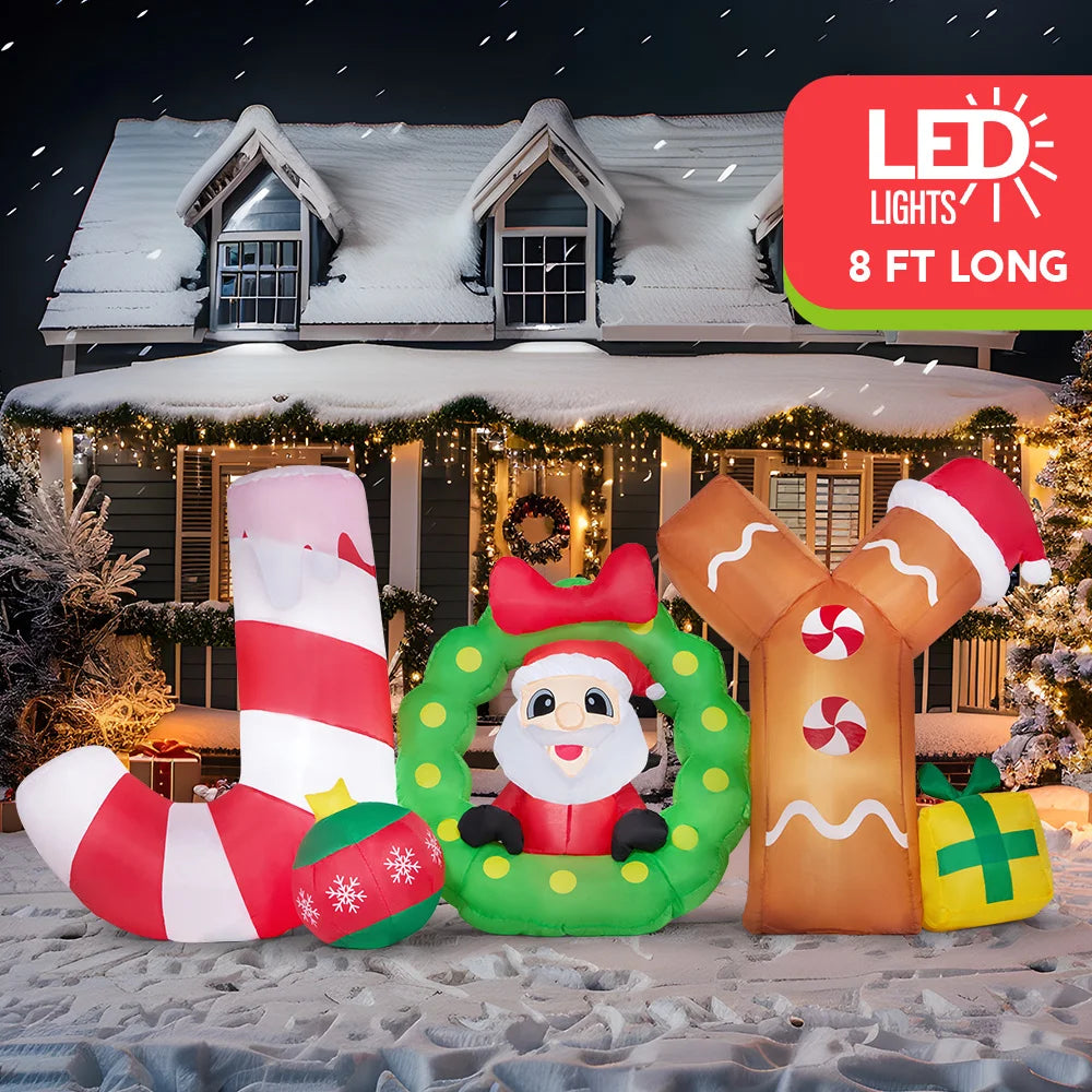 Joyribbon Santa JOY Christmas inflatable glowing in a yard with an eight-foot length label.