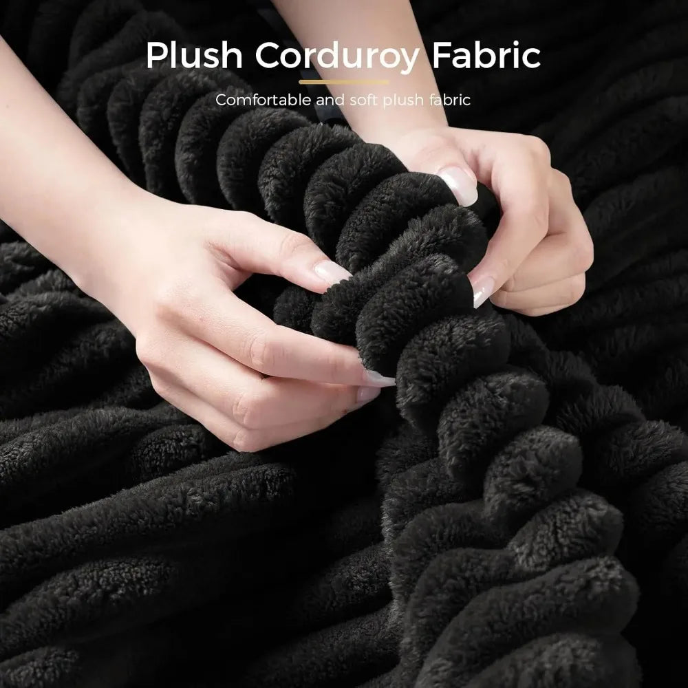 Sylvellen close-up of black wide-rib corduroy upholstery