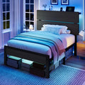 Black twin bed with blue LED headboard lighting and open under-bed storage space