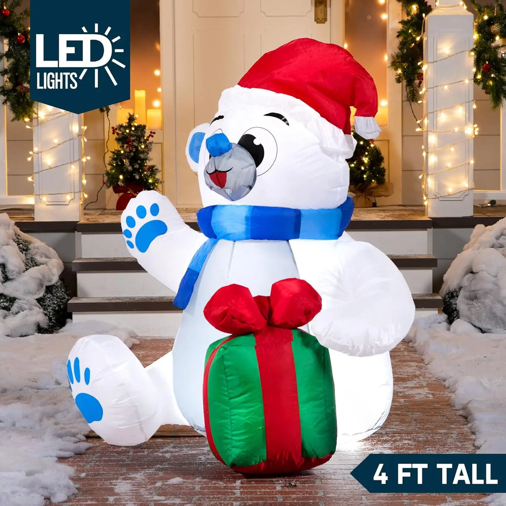 Giftpaw polar bear Christmas inflatable illuminated at night with a four-foot height label.