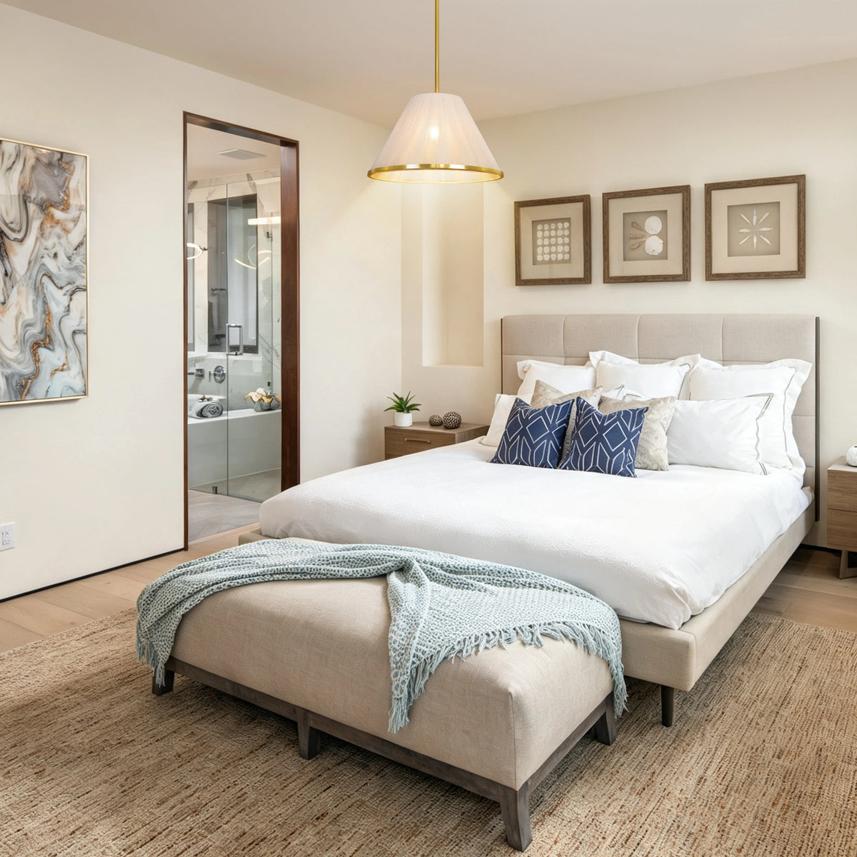 Loomveil woven-shade pendant shown beside a bed in a neutral bedroom.